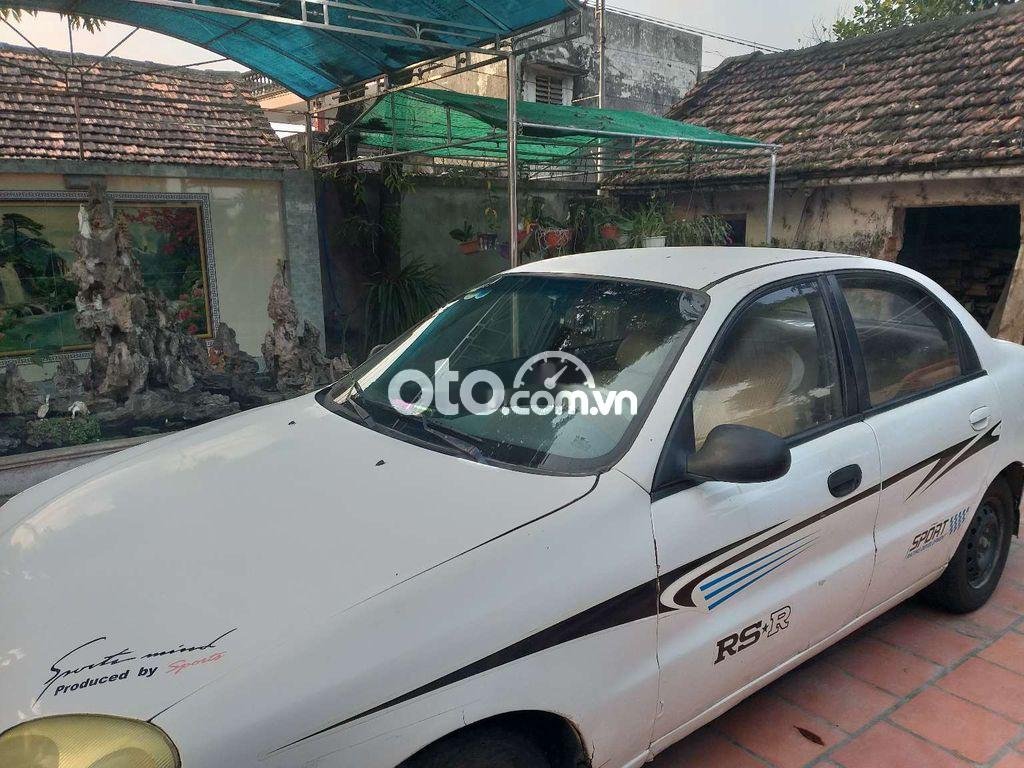 Daewoo Lanos MT 2003 - Xe Daewoo Lanos MT năm sản xuất 2003, màu trắng, nhập khẩu nguyên chiếc