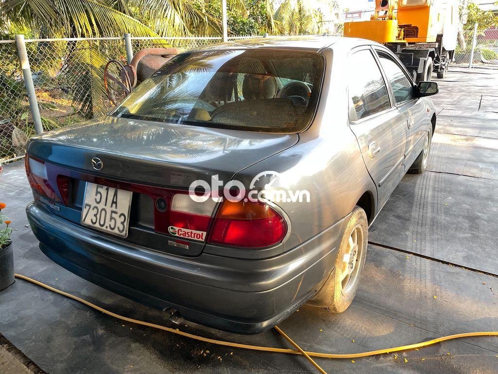 Mazda 323 1999 - Bán ô tô Mazda 323 2.0 MT năm 1999, màu xám chính chủ, giá tốt