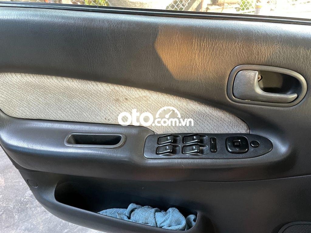 Mazda 323 1999 - Bán ô tô Mazda 323 2.0 MT năm 1999, màu xám chính chủ, giá tốt