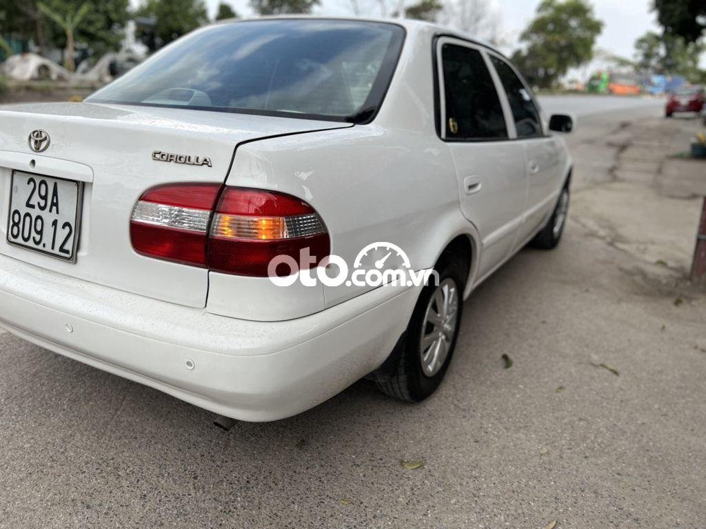 Toyota Corolla 2001 - Bán Toyota Corolla 1.8 E MT năm 2001, màu trắng
