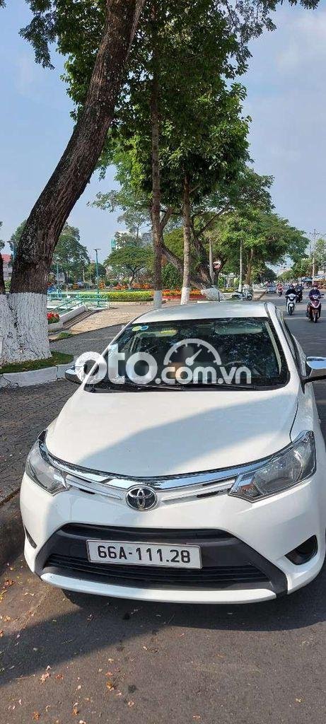 Toyota Vios MT 2014 - Cần bán lại xe Toyota Vios MT năm sản xuất 2014, màu trắng, nhập khẩu