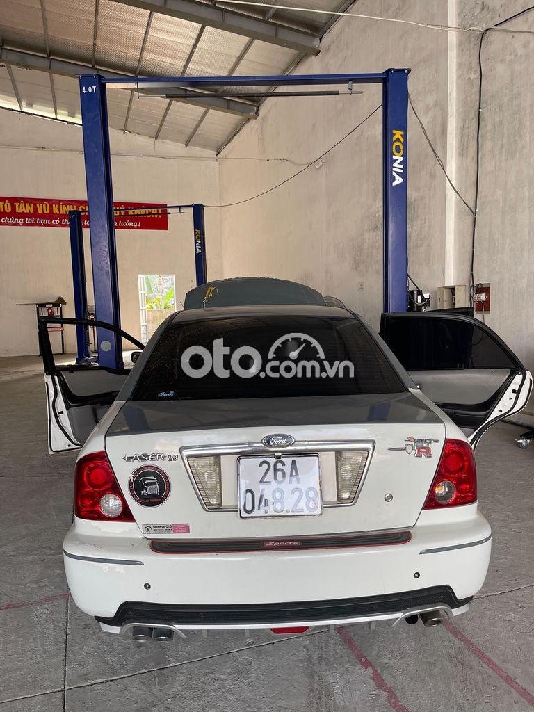 Ford Laser 1.8MT 2002 - Cần bán xe Ford Laser 1.8MT năm 2002, màu trắng, giá 130tr