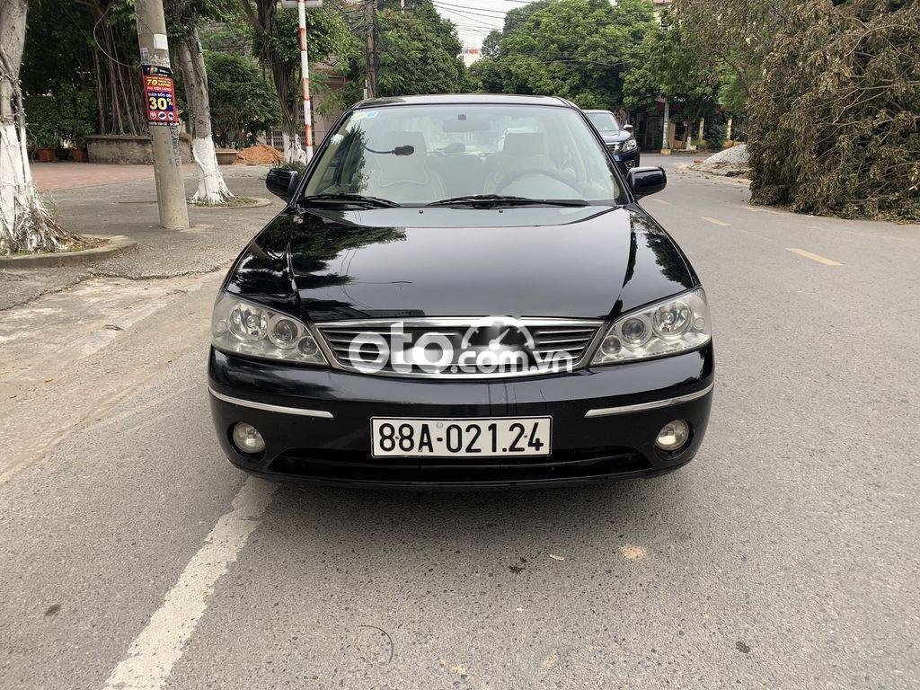 Ford Laser  1.6AT 2004 - Cần bán Ford Laser 1.6AT năm 2004, màu đen, 160 triệu