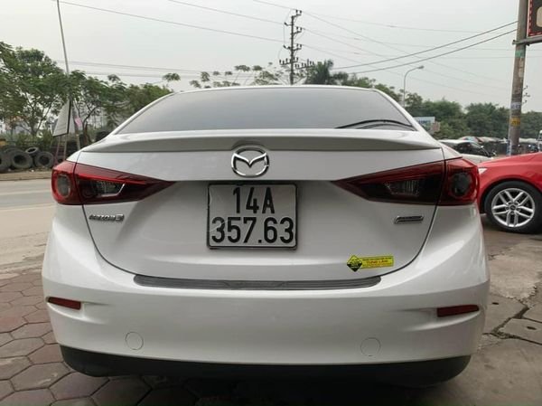 Mazda 3 AT 2016 - Cần bán Mazda 3 AT năm 2016, màu trắng, giá 488tr