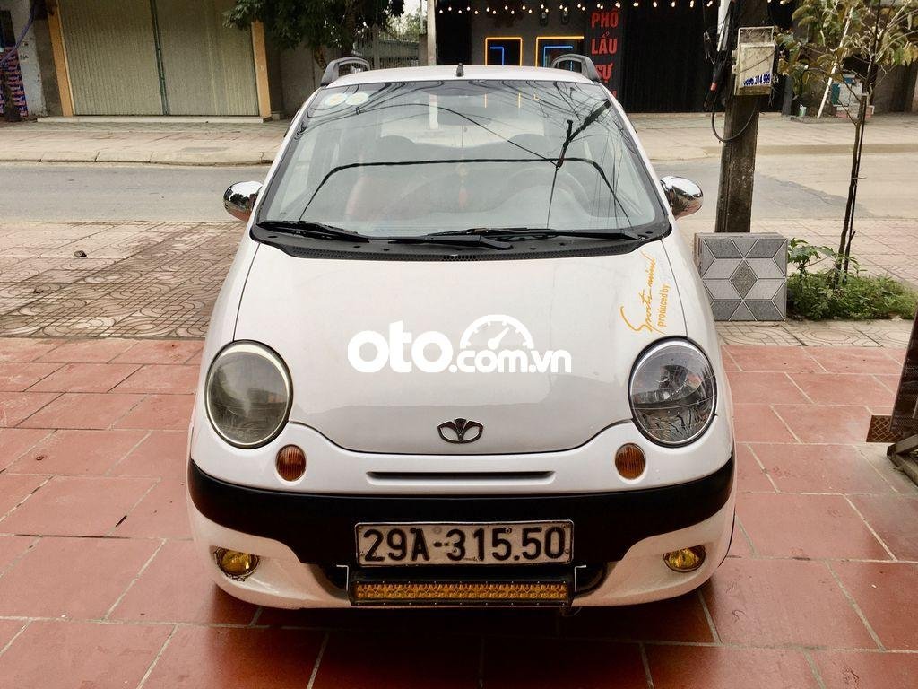 Daewoo Matiz SE 2007 - Cần bán xe Daewoo Matiz SE sản xuất 2007, màu trắng xe gia đình 