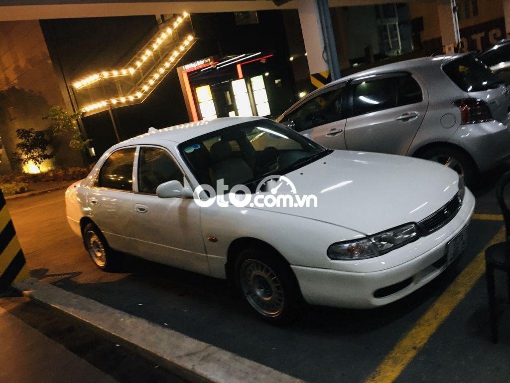 Mazda 626 MT 1996 - Bán ô tô Mazda 626 MT năm 1996, màu trắng