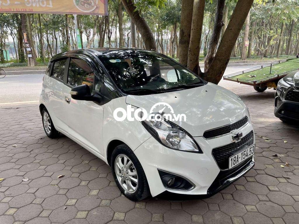 Chevrolet Spark LT 2013 - Bán ô tô Chevrolet Spark LT năm 2013, màu trắng, xe nhập, 205tr