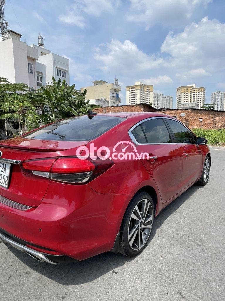 Kia Cerato AT 2017 - Cần bán lại xe Kia Cerato AT sản xuất năm 2017, màu đỏ, giá 475tr