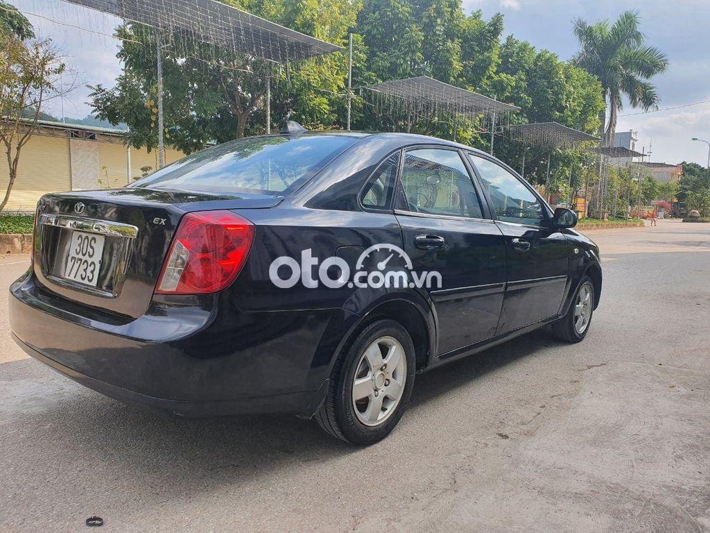 Daewoo Lacetti EX 2009 - Cần bán Daewoo Lacetti EX năm 2009, màu đen xe gia đình