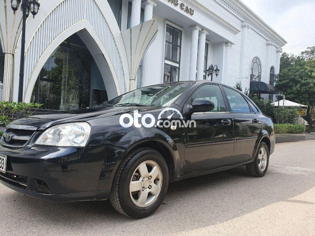 Daewoo Lacetti EX 2009 - Cần bán Daewoo Lacetti EX năm 2009, màu đen xe gia đình