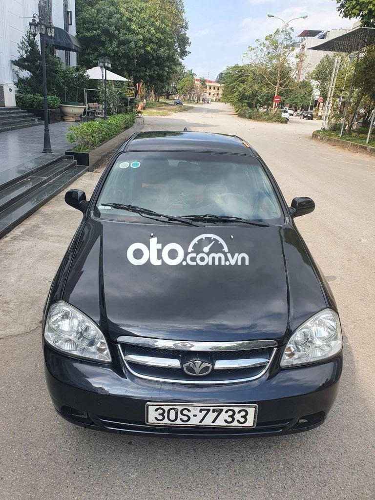 Daewoo Lacetti EX 2009 - Cần bán Daewoo Lacetti EX năm 2009, màu đen xe gia đình