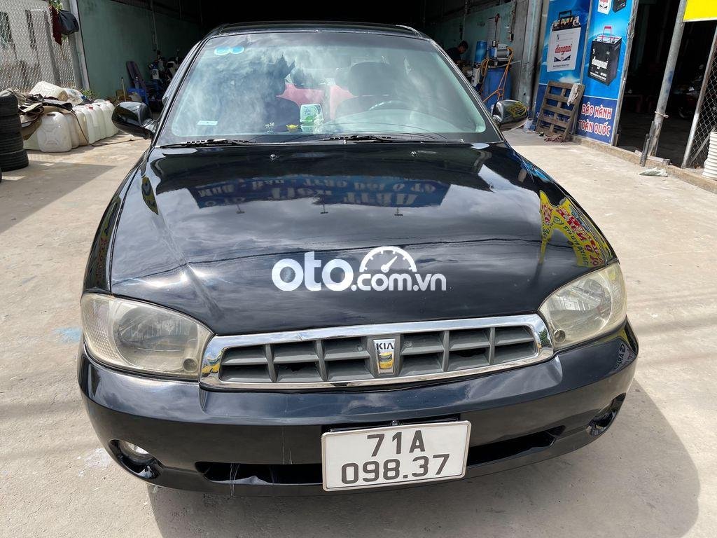 Kia Spectra 2002 - Cần bán xe Kia Spectra năm sản xuất 2002, màu đen chính chủ, 79tr