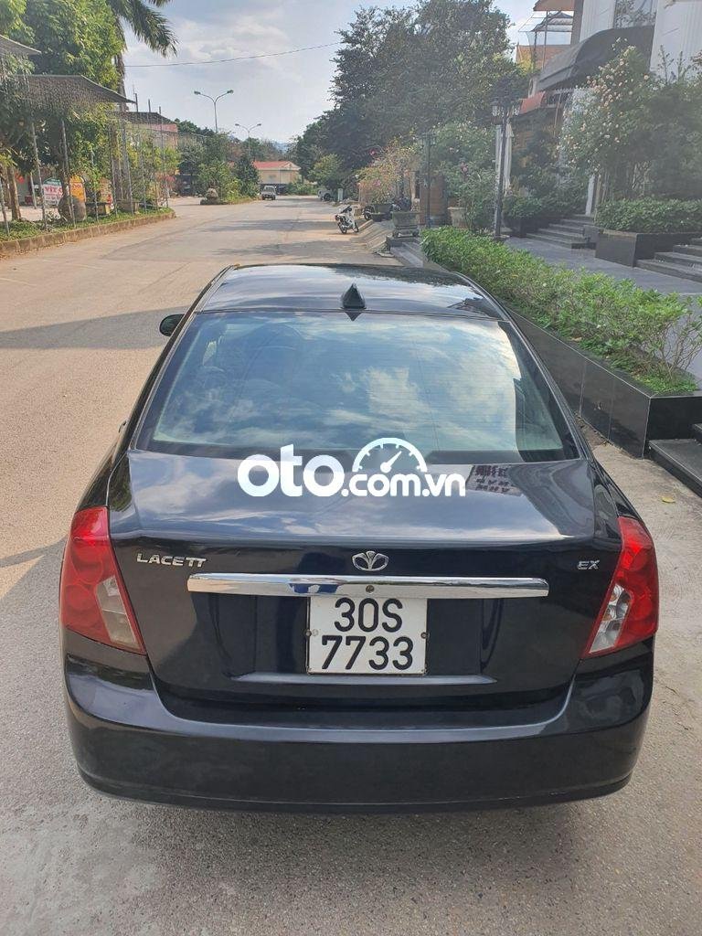 Daewoo Lacetti EX 2009 - Cần bán Daewoo Lacetti EX năm 2009, màu đen xe gia đình