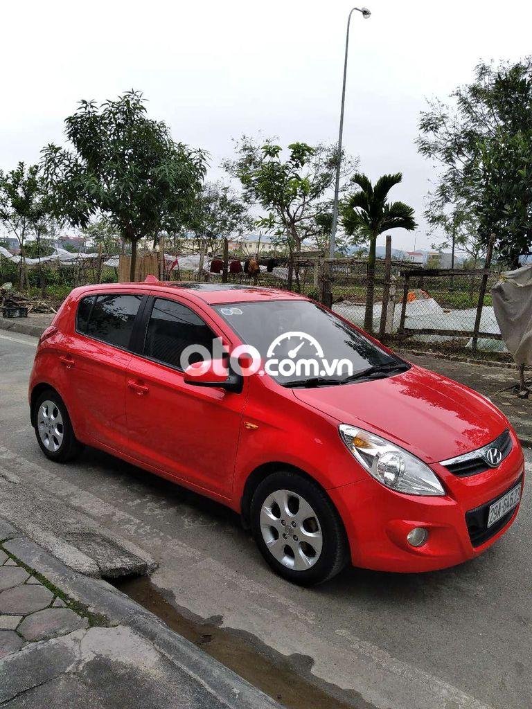 Hyundai i20 1.4AT  2012 - Cần bán lại xe Hyundai i20 1.4AT sản xuất năm 2012, màu đỏ, nhập khẩu giá cạnh tranh