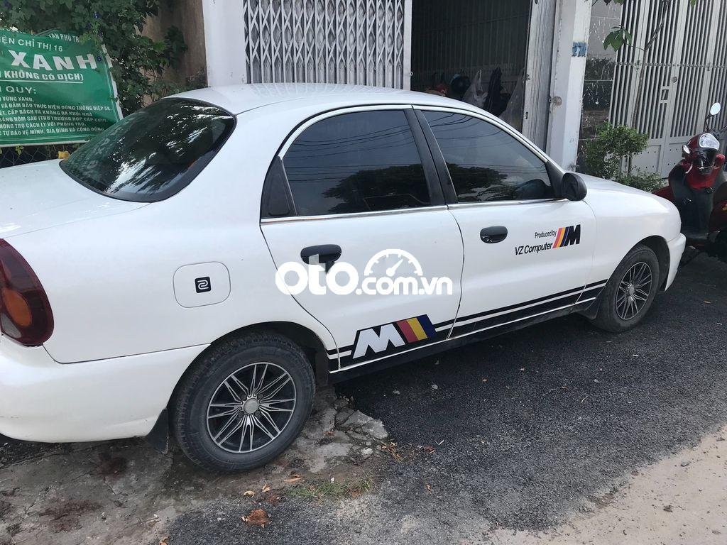 Daewoo Lanos   MT 2002 - Bán xe Daewoo Lanos MT sản xuất 2002, màu trắng, 66tr