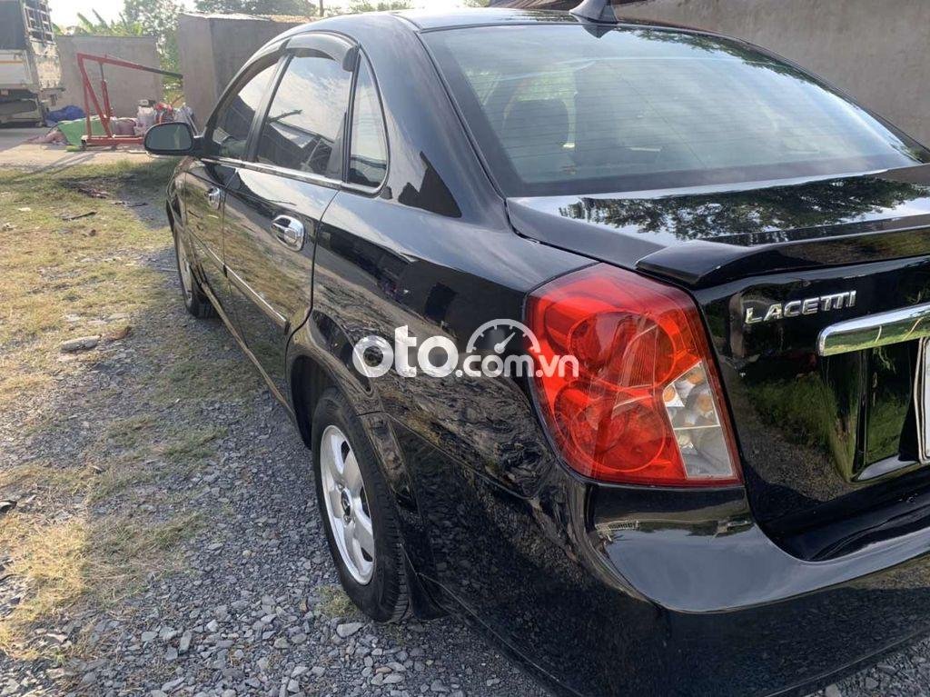 Daewoo Lacetti SE 2010 - Bán ô tô Daewoo Lacetti SE sản xuất 2010, màu đen, xe nhập