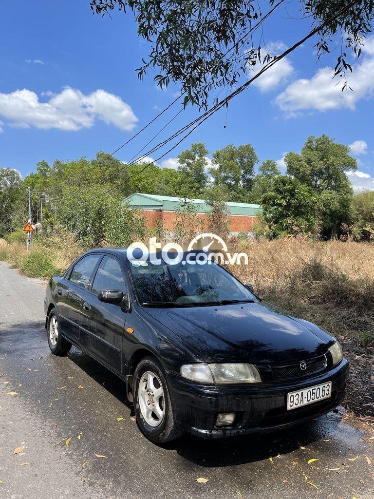 Mazda 323   GLX 1998 - Bán xe Mazda 323 GLX sản xuất 1998, màu đen, xe nhập