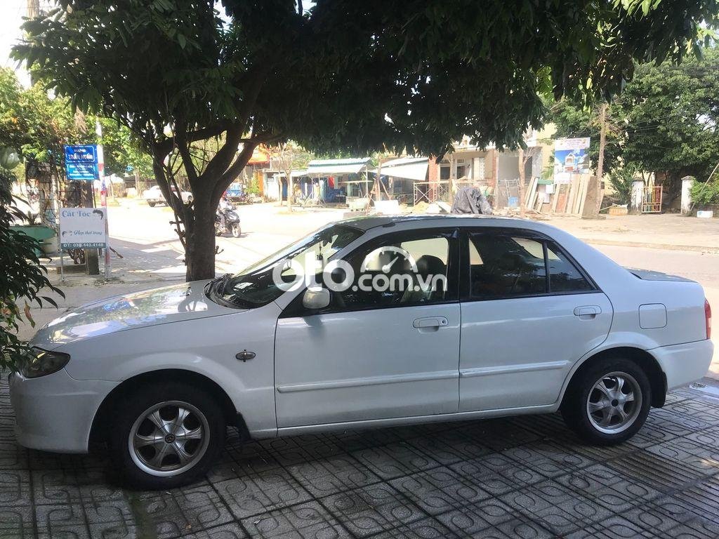 Mazda 323 2.0MT 2003 - Bán Mazda 323 2.0MT năm sản xuất 2003, màu trắng, nhập khẩu nguyên chiếc, giá 119tr