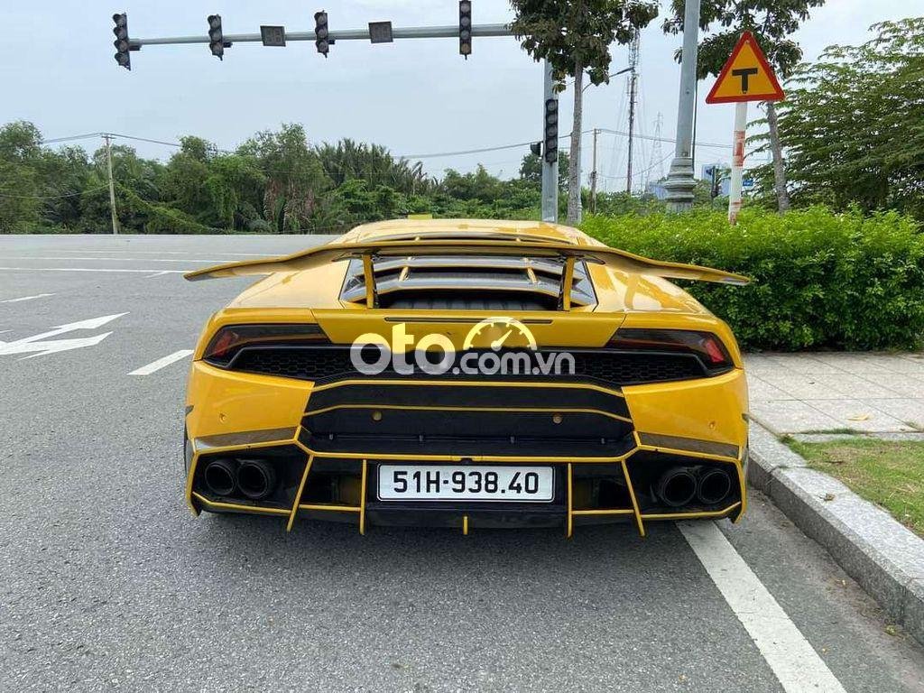 Lamborghini Huracan LP610-4 Coupe 2014 - Cần bán lại xe Lamborghini Huracan LP610-4 Coupe năm 2014, màu vàng, xe nhập