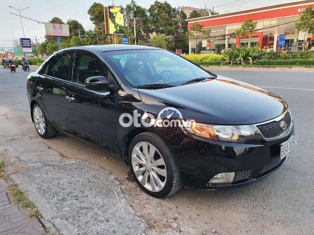 Kia Forte  AT  2012 - Bán ô tô Kia Forte AT năm sản xuất 2012, màu đen, 399tr