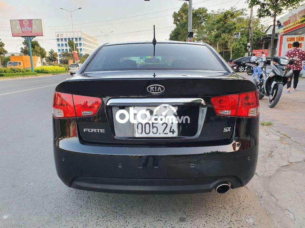 Kia Forte  AT  2012 - Bán ô tô Kia Forte AT năm sản xuất 2012, màu đen, 399tr