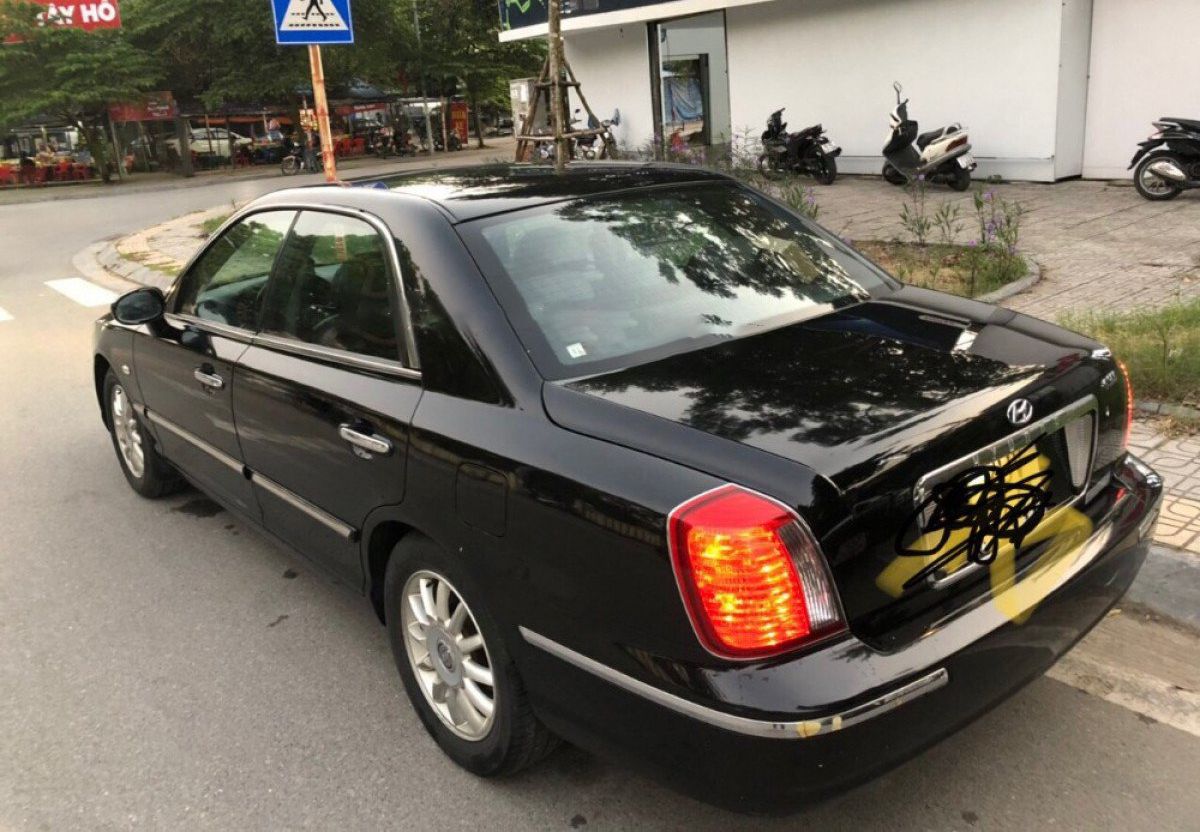 Hyundai XG 300 V6 3.0  2004 - Bán ô tô Hyundai XG 300 V6 3.0 sản xuất 2004, màu đen, xe nhập