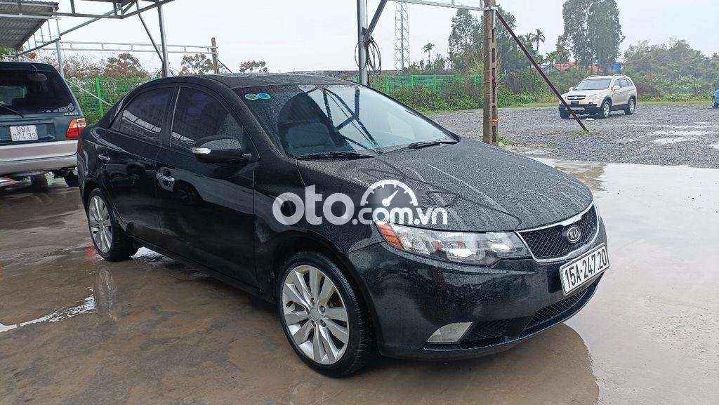 Kia Forte     1.6AT 2009 - Bán Kia Forte 1.6AT năm sản xuất 2009, màu đen, xe nhập, 295tr