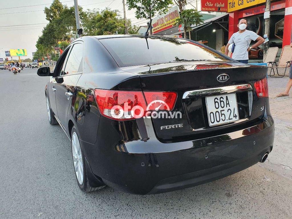 Kia Forte  AT  2012 - Bán ô tô Kia Forte AT năm sản xuất 2012, màu đen, 399tr