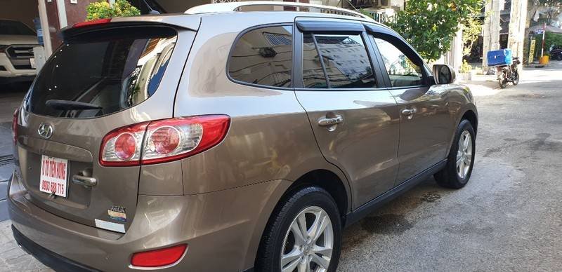 Hyundai Santa Fe MLX 2009 - Cần bán lại xe Hyundai Santa Fe MLX năm sản xuất 2009, màu nâu