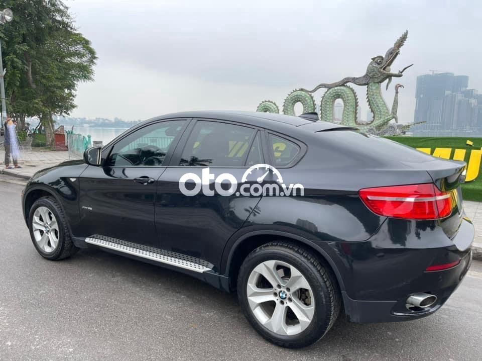 BMW X6    XDriver 35i 2010 - Bán xe BMW X6 XDriver 35i sản xuất 2010, màu đen chính chủ