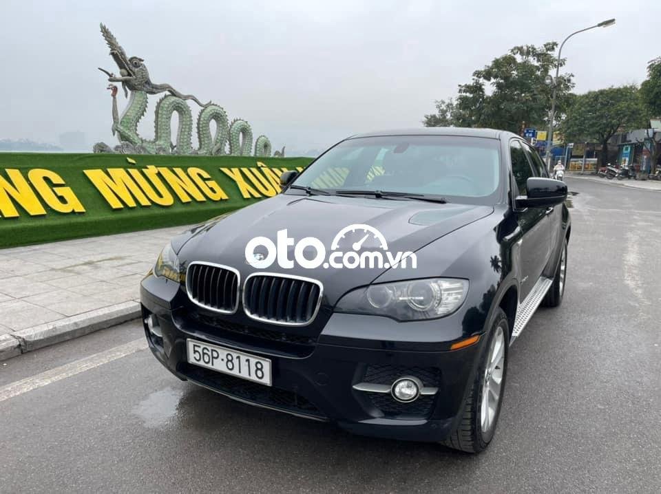 BMW X6    XDriver 35i 2010 - Bán xe BMW X6 XDriver 35i sản xuất 2010, màu đen chính chủ