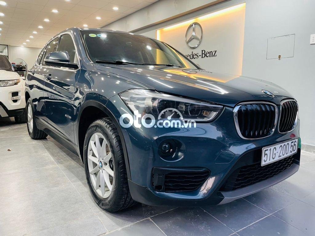 BMW X1      2016 - Cần bán BMW X1 sản xuất 2016, màu xanh lam, giá chỉ 938 triệu