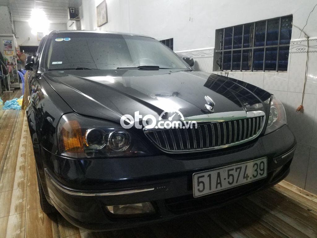 Daewoo Magnus 2005 - Cần bán xe Daewoo Magnus 2.0 năm 2005, màu đen, nhập khẩu nguyên chiếc, 148tr