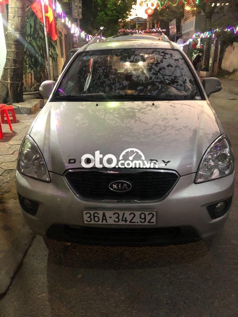 Kia Carens 2.0MT 2012 - Cần bán Kia Carens 2.0MT năm 2012, màu bạc chính chủ, giá chỉ 350 triệu