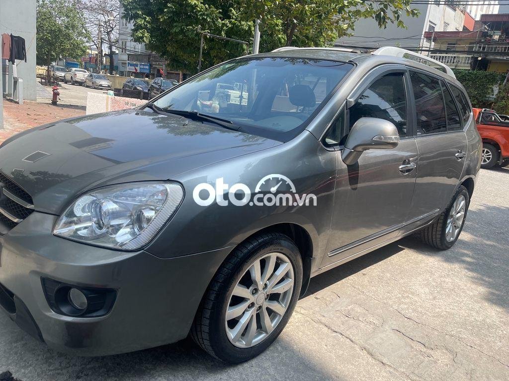 Kia Carens   2.0AT 2012 - Bán ô tô Kia Carens 2.0AT sản xuất năm 2012, màu xám số tự động