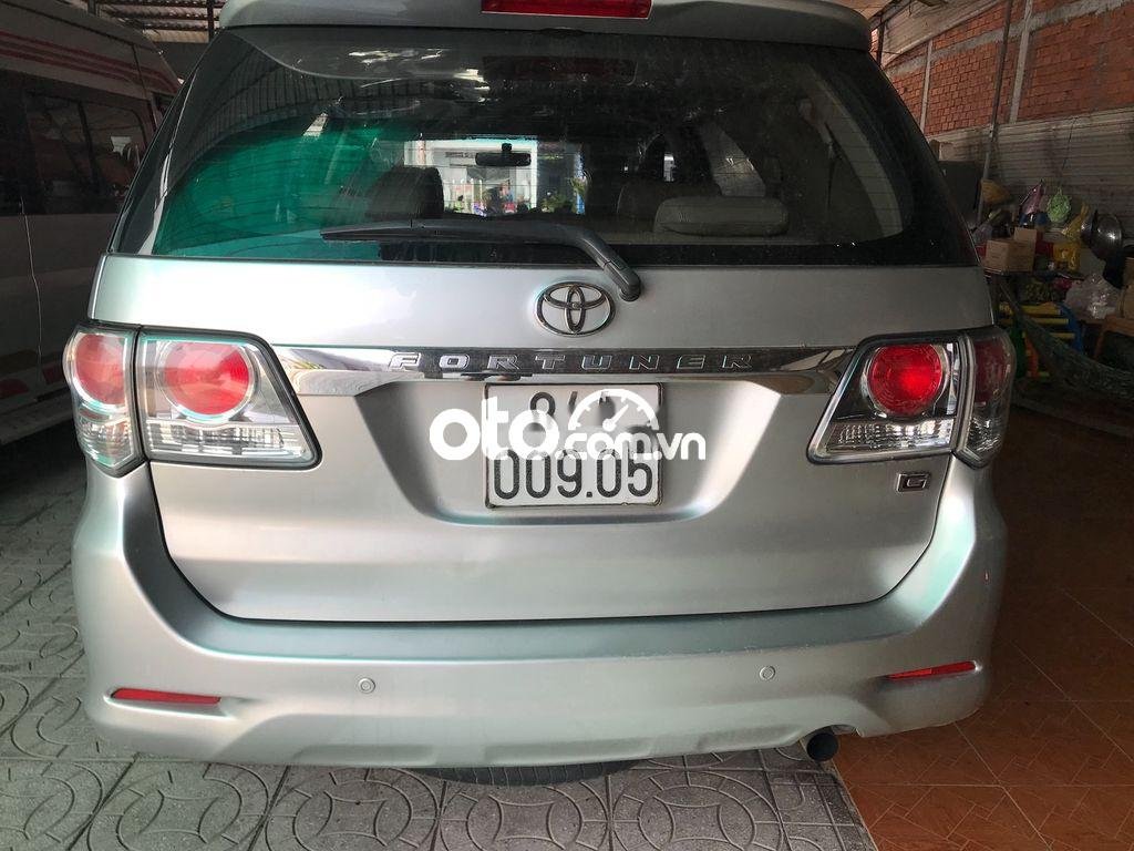 Toyota Fortuner  2.5G 4x2MT 2014 - Bán ô tô Toyota Fortuner 2.5G 4x2MT năm sản xuất 2014, màu bạc, giá chỉ 569 triệu