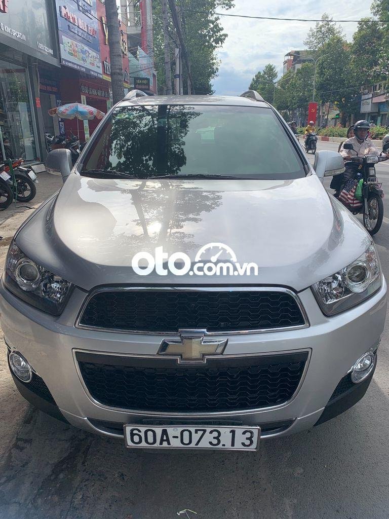 Chevrolet Captiva  LT   2013 - Bán Chevrolet Captiva LT sản xuất năm 2013, màu bạc còn mới