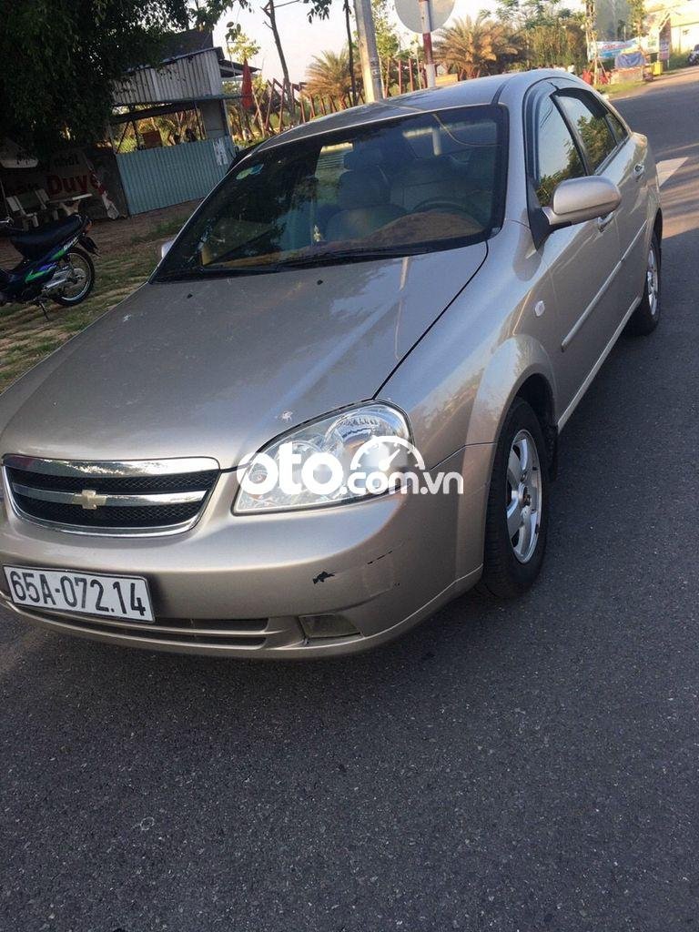 Chevrolet Lacetti 2011 - Cần bán lại xe Chevrolet Lacetti EX 1.6MT 2011, màu vàng