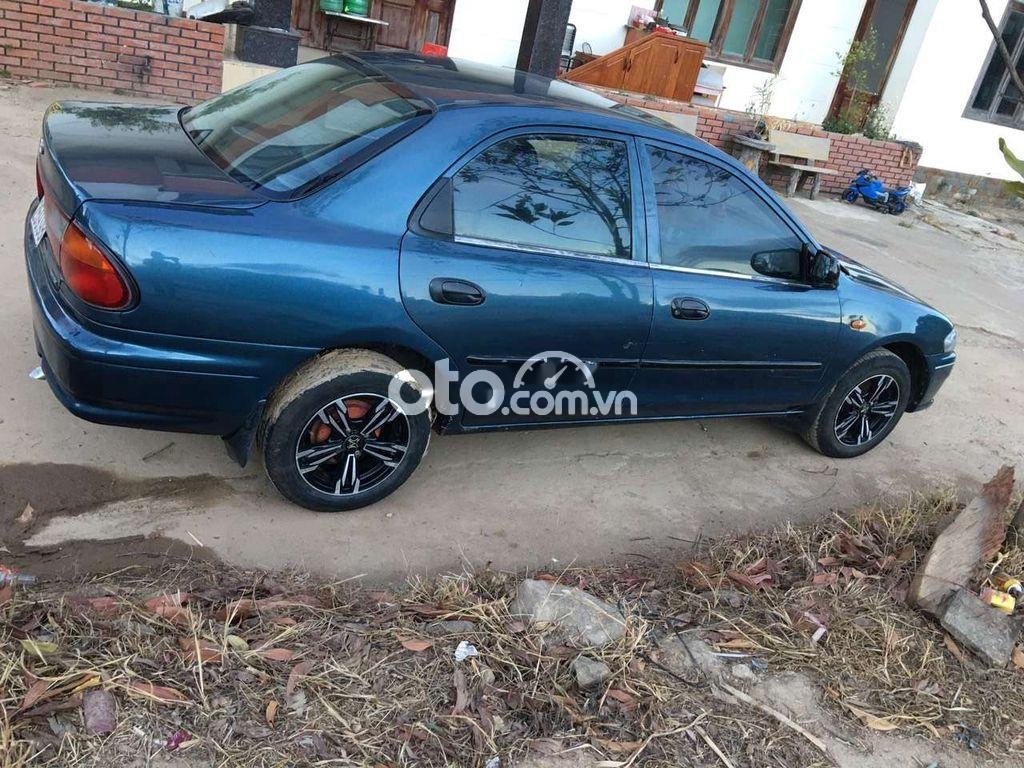 Mazda 323   2000 - Xe Mazda 323 sản xuất năm 2000, màu xanh lam