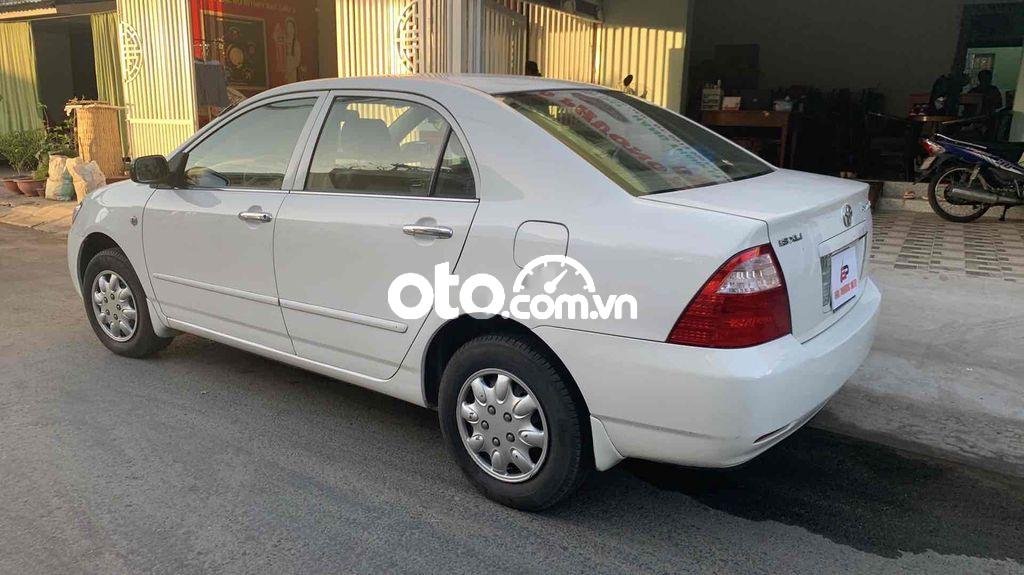 Toyota Corolla GLI 2003 - Bán Toyota Corolla GLI sản xuất 2003, màu trắng, xe nhập, 255tr