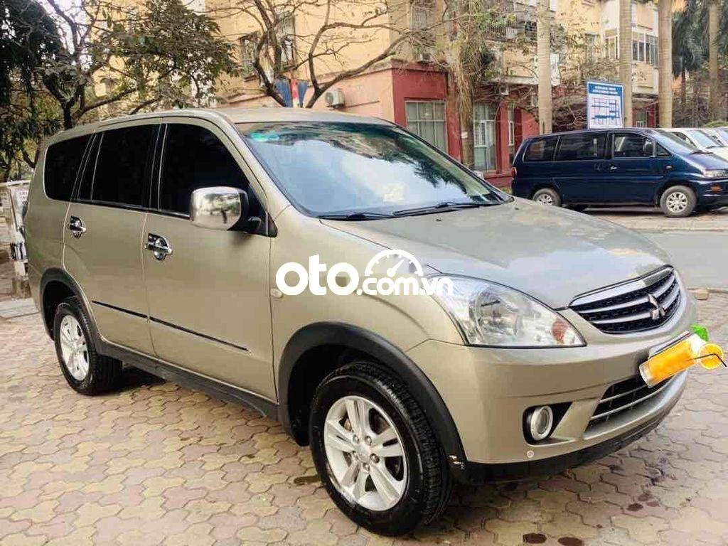 Mitsubishi Zinger    GLS  2011 - Cần bán lại xe Mitsubishi Zinger GLS sản xuất năm 2011, màu bạc 