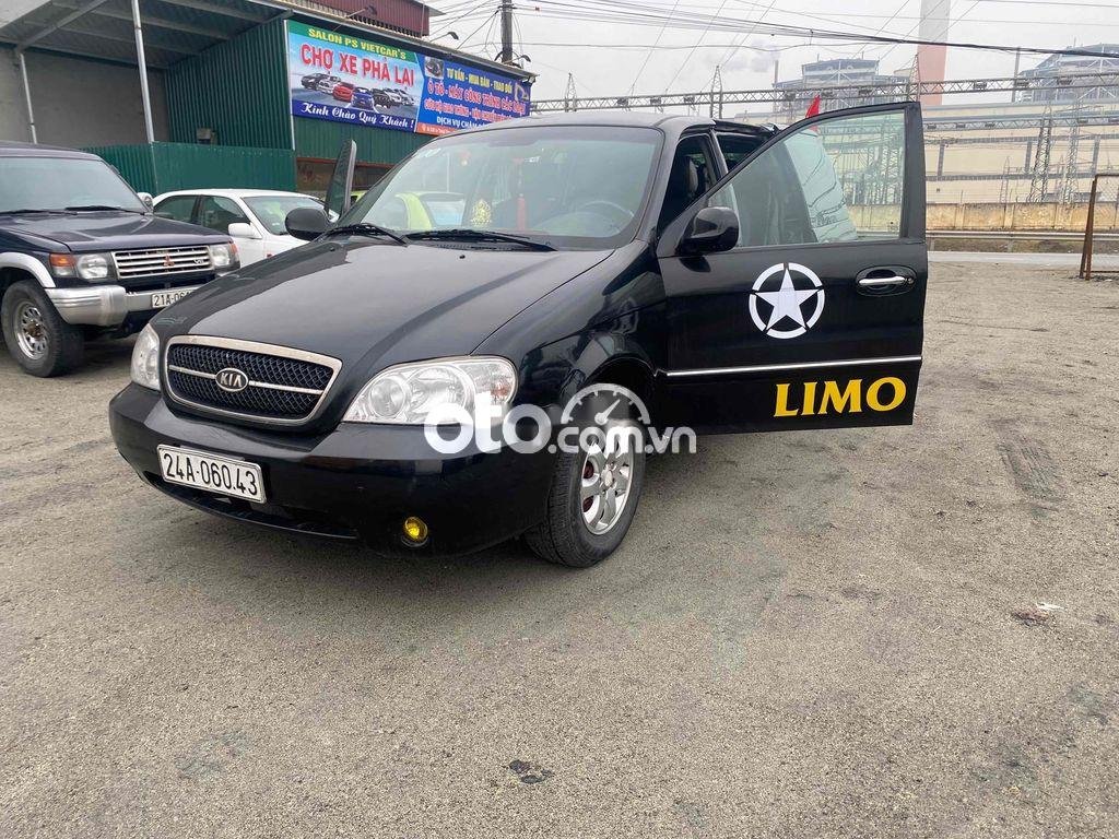 Kia Carnival 2.5AT 2008 - Cần bán xe Kia Carnival 2.5AT năm 2008, màu đen 