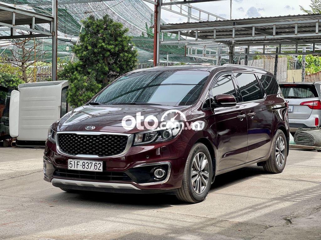 Kia VT250 2016 - Bán xe Kia Sedona máy xăng năm 2016, màu đỏ mận, một chủ sử dụng từ mới