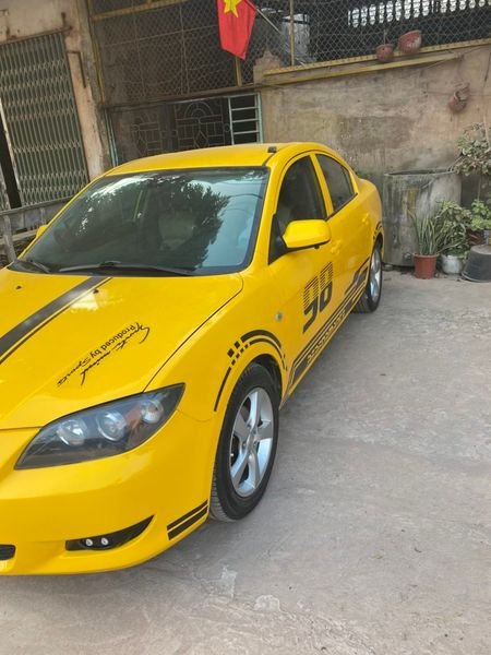 Mazda 3 AT 2005 - Bán Mazda 3 AT năm 2005, màu vàng, xe đẹp giá cạnh tranh