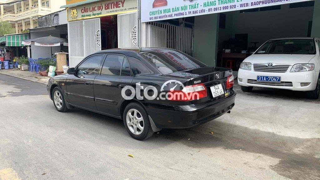 Mazda 626 2003 - Bán Mazda 626 MT sản xuất 2003, màu đen, nhập khẩu giá cạnh tranh