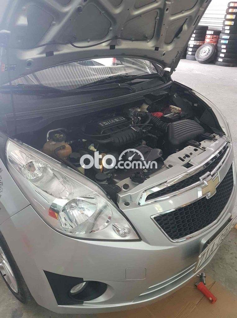 Chevrolet Spark LT 2012 - Cần bán gấp Chevrolet Spark LT năm 2012, màu bạc, nhập khẩu xe gia đình