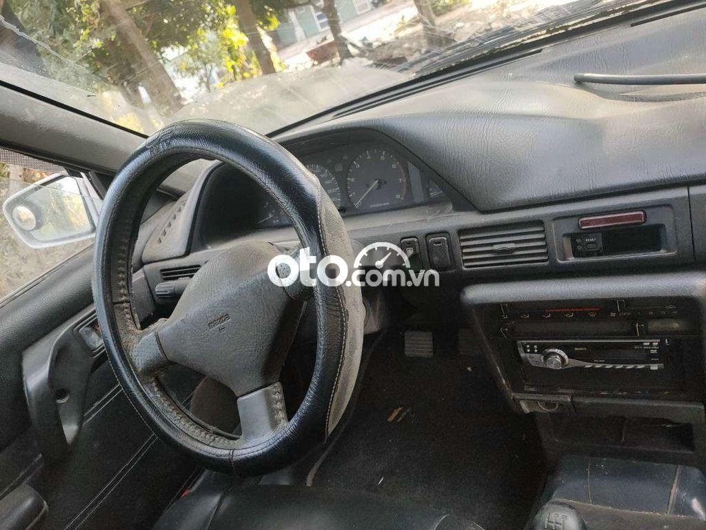 Mazda 323 1995 - Bán ô tô Mazda 323 sản xuất 1995, màu trắng, nhập khẩu