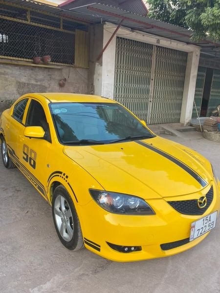 Mazda 3 AT 2005 - Bán Mazda 3 AT năm 2005, màu vàng, xe đẹp giá cạnh tranh