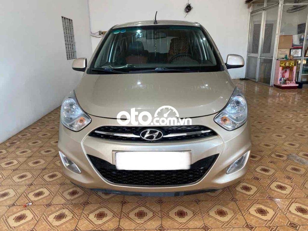 Hyundai Premio 2011 - Bán Hyundai Grand i10 1.2AT sản xuất 2011, màu vàng cát, nhập khẩu, xe chính chủ bán