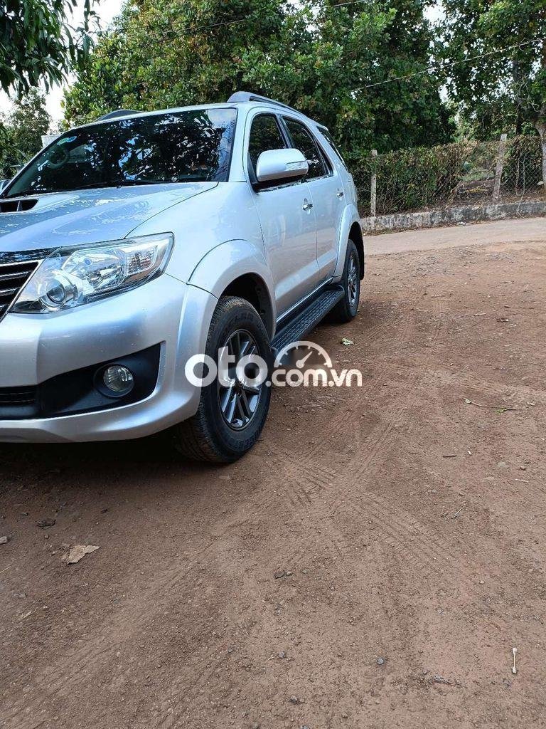 Toyota Fortuner 2014 - Bán xe Toyota Fortuner 2.5G 4x2MT sản xuất năm 2014, màu bạc ít sử dụng